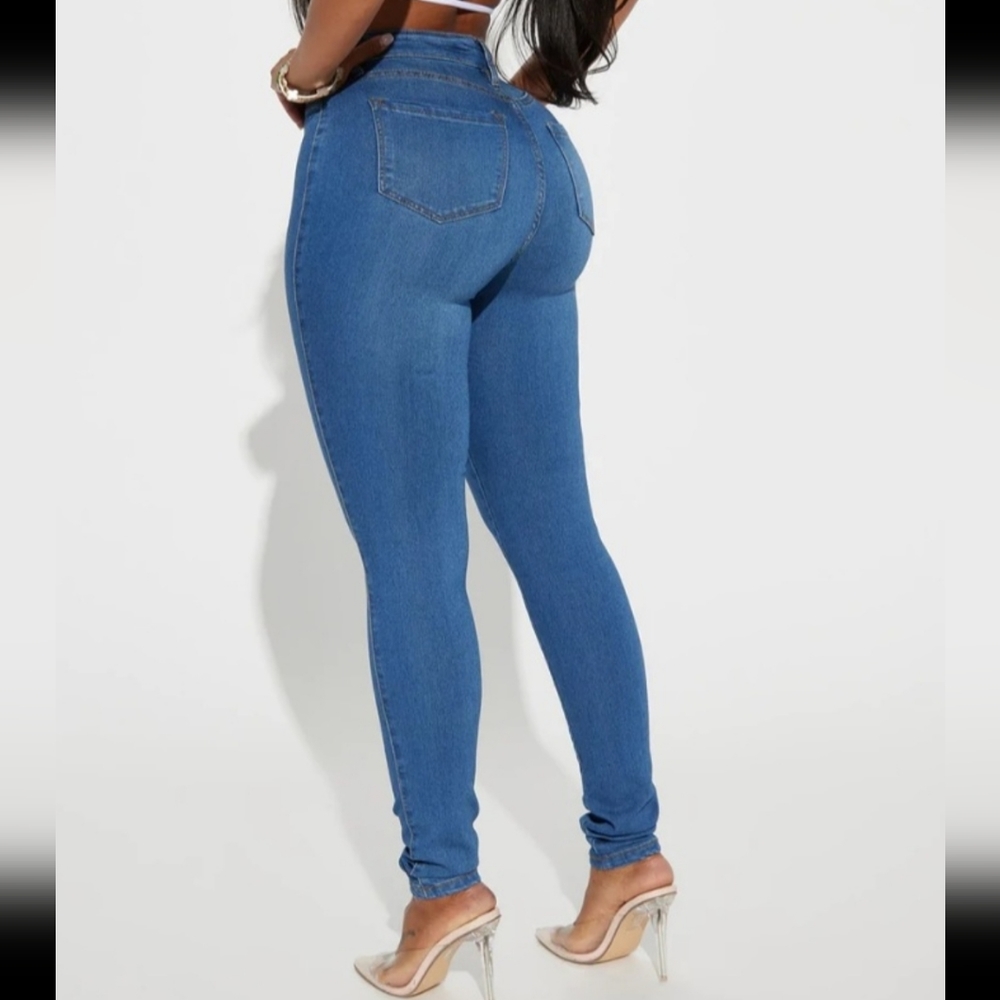 Fashion Nova ultra high-rise medium wash skinny jeans, size 13.